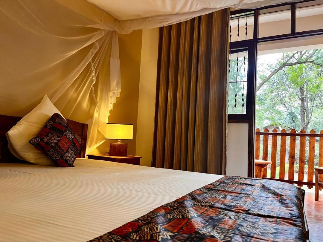 Kilimanjaro Lodge - Mcf Моши Экстерьер фото